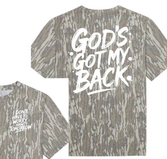 Juniors' GOD'S GOT MY BACK Front/Back Camo Graphic Tee (Bottomland Camo)