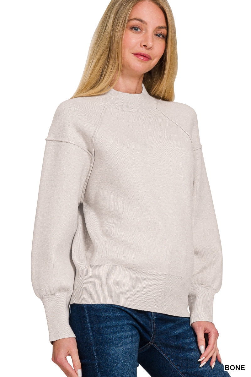 Ladies Mock Neck Exposed Seam Sweater