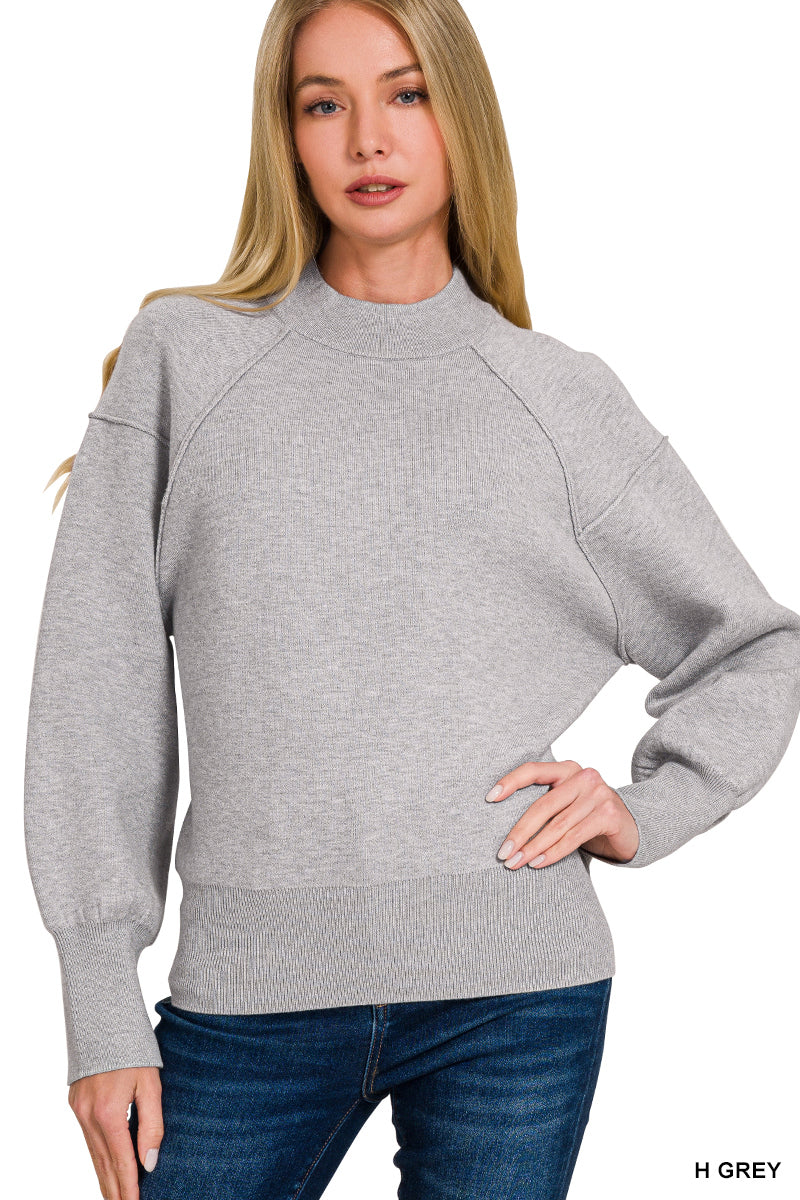 Ladies Mock Neck Exposed Seam Sweater