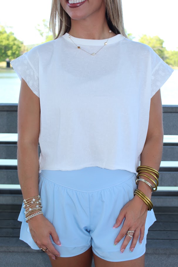 Juniors' Kimberly Eyelet Crossover Back S/S Top (White)