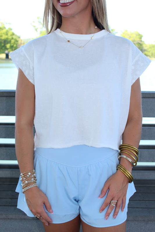 Juniors' Kimberly Eyelet Crossover Back S/S Top (White)