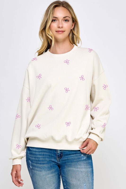 Juniors' Bow Cluster Sweatshirt (Ivory/Pink)