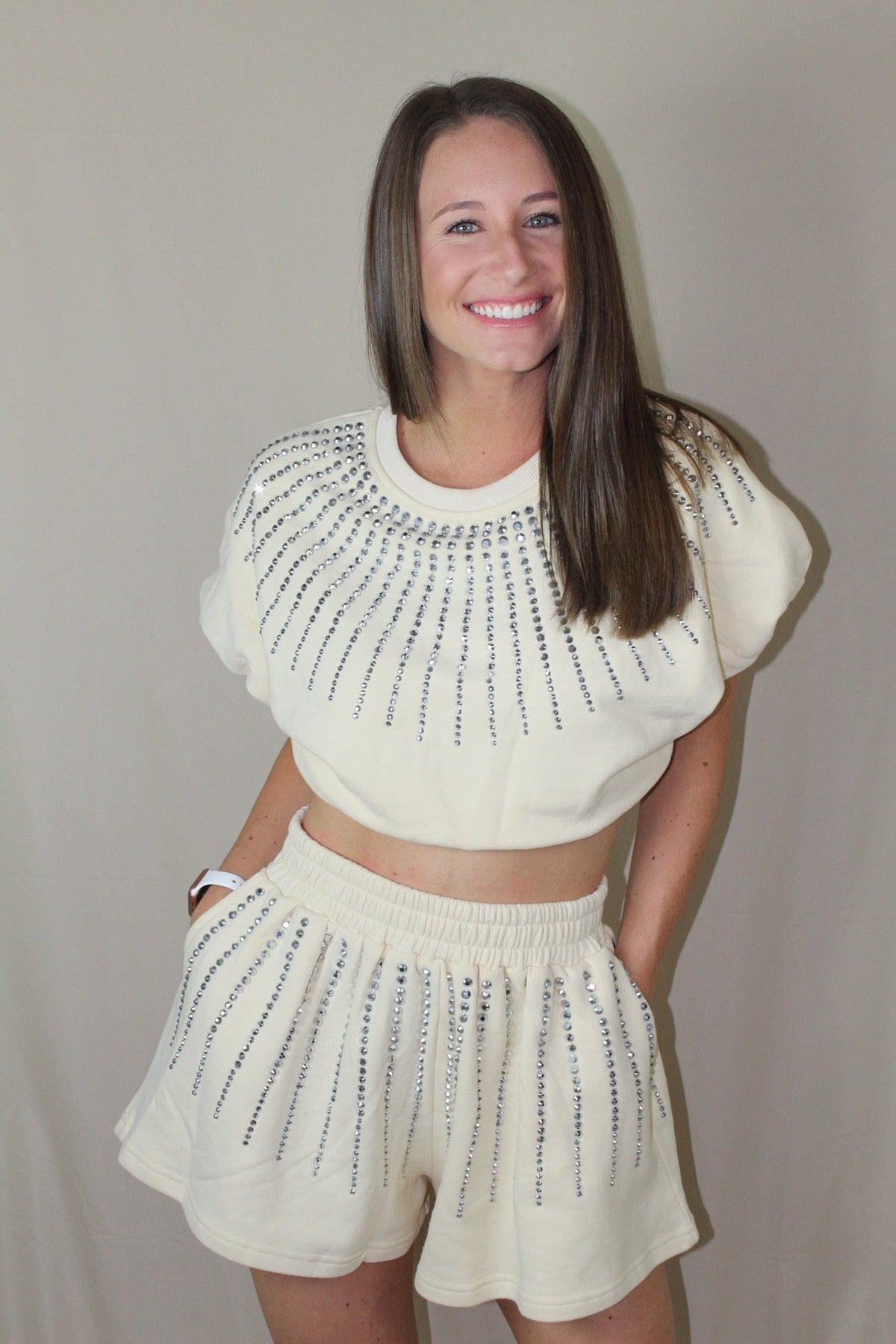 Cream rhinestone sweat set on model