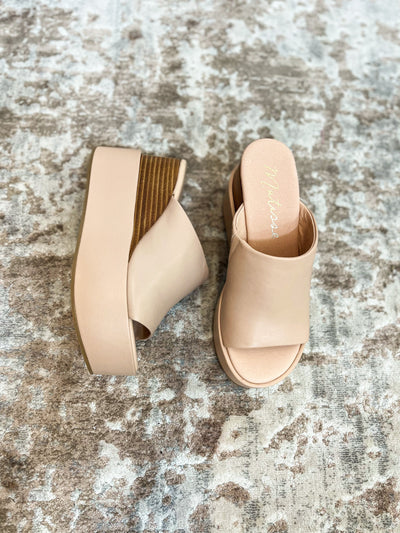 Blush platform wedge sandals flat lay